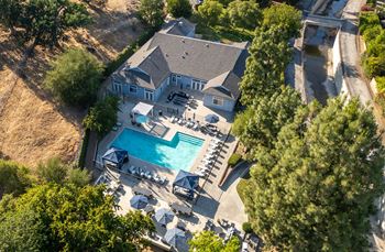 A large house with a pool and a deck.